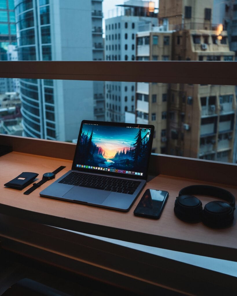 A laptop on a windowsill in a flat